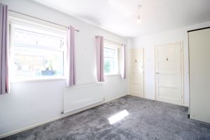 Bedroom One- click for photo gallery